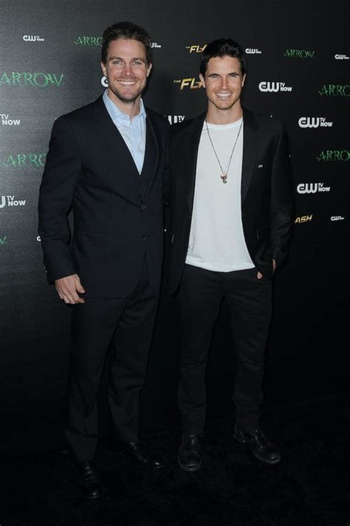 Unraveling The Amell Connection: Are Robbie And Stephen Amell Brothers?