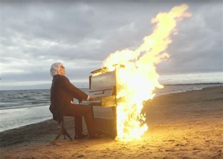 Embers Of Melody: The Guy Playing Piano On Fire