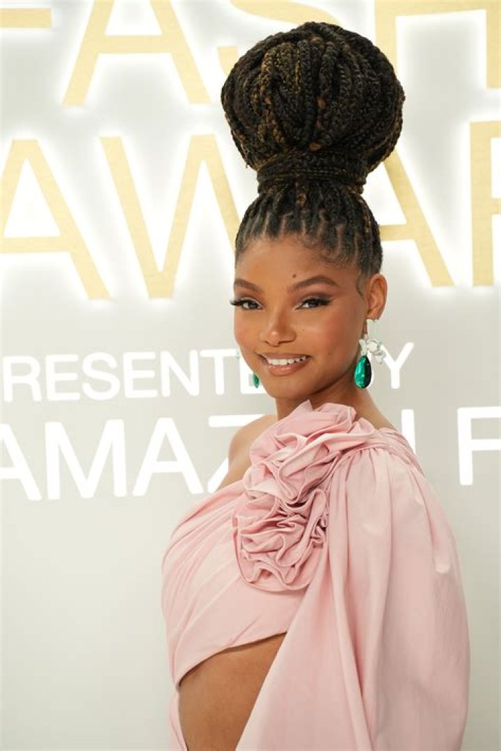Mastering The Art Of The Halle Bailey Hair Flip Training